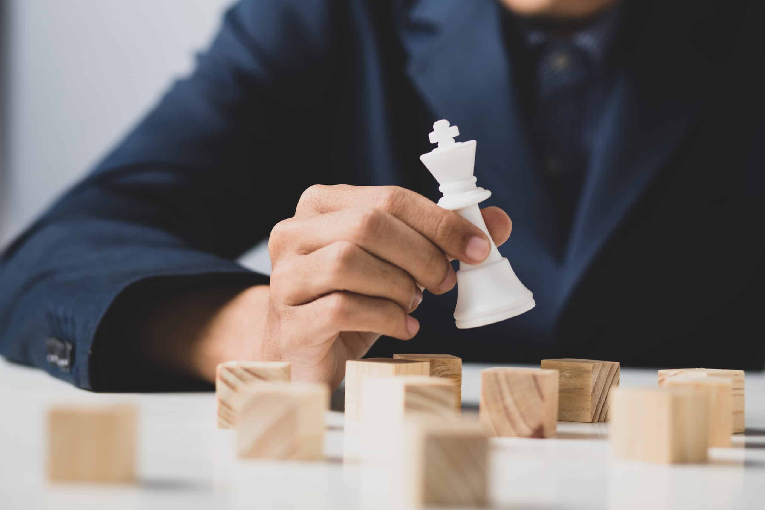 a man playing the game of chess at work