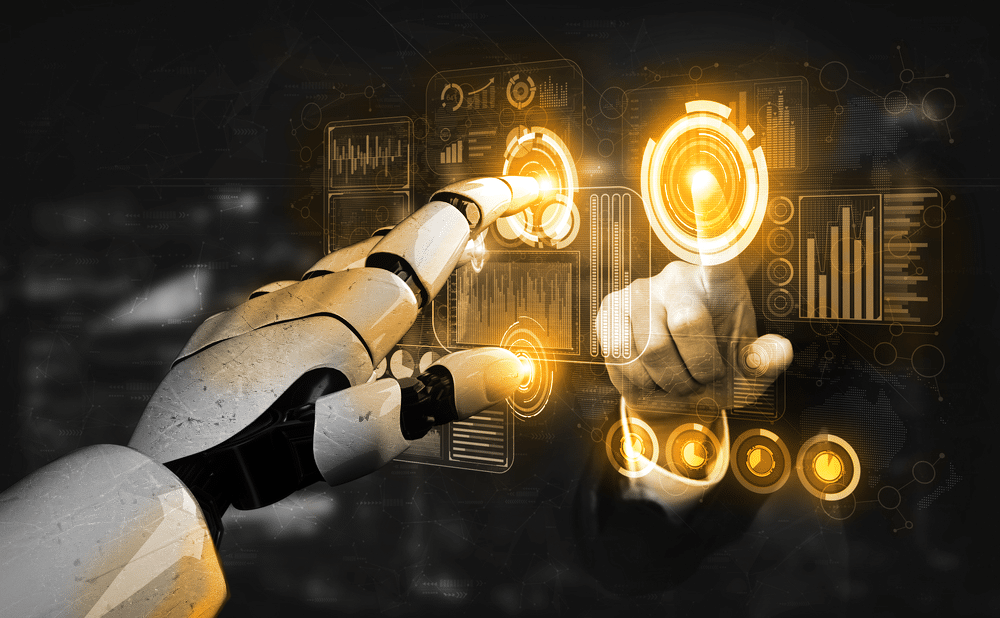 A robot hand and a human hand working together to solve problems